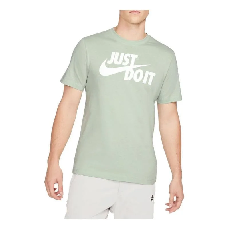 Φωτογραφία προϊόντος: NIKE SPORTSWEAR `JUST DO IT` SWOOSH T-SHIRT ΠΡΑΣΙΝΟ