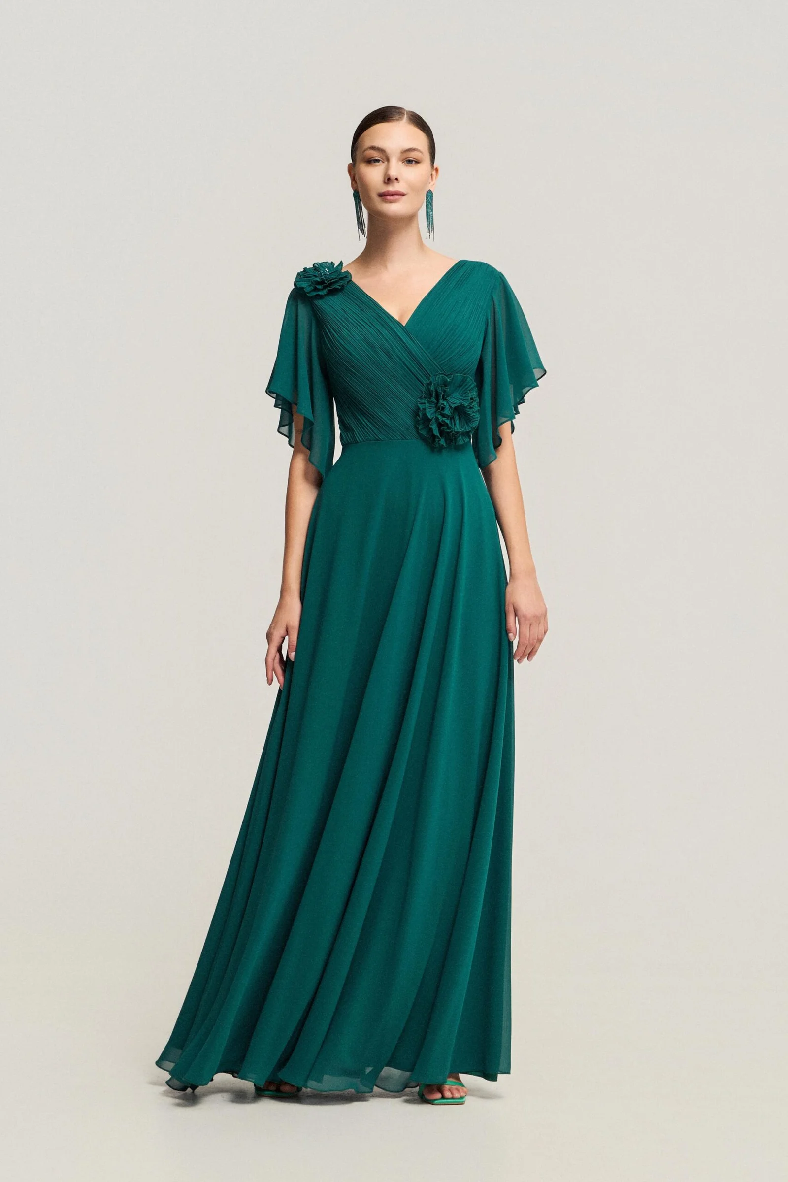 Φωτογραφία προϊόντος: Andrianopoulos Fashion Stores since 1930 Ρομαντικό Φόρεμα με Πλισέ Μπούστο και 3D Λουλούδια σε Σμαραγδί – Andrianopoulos