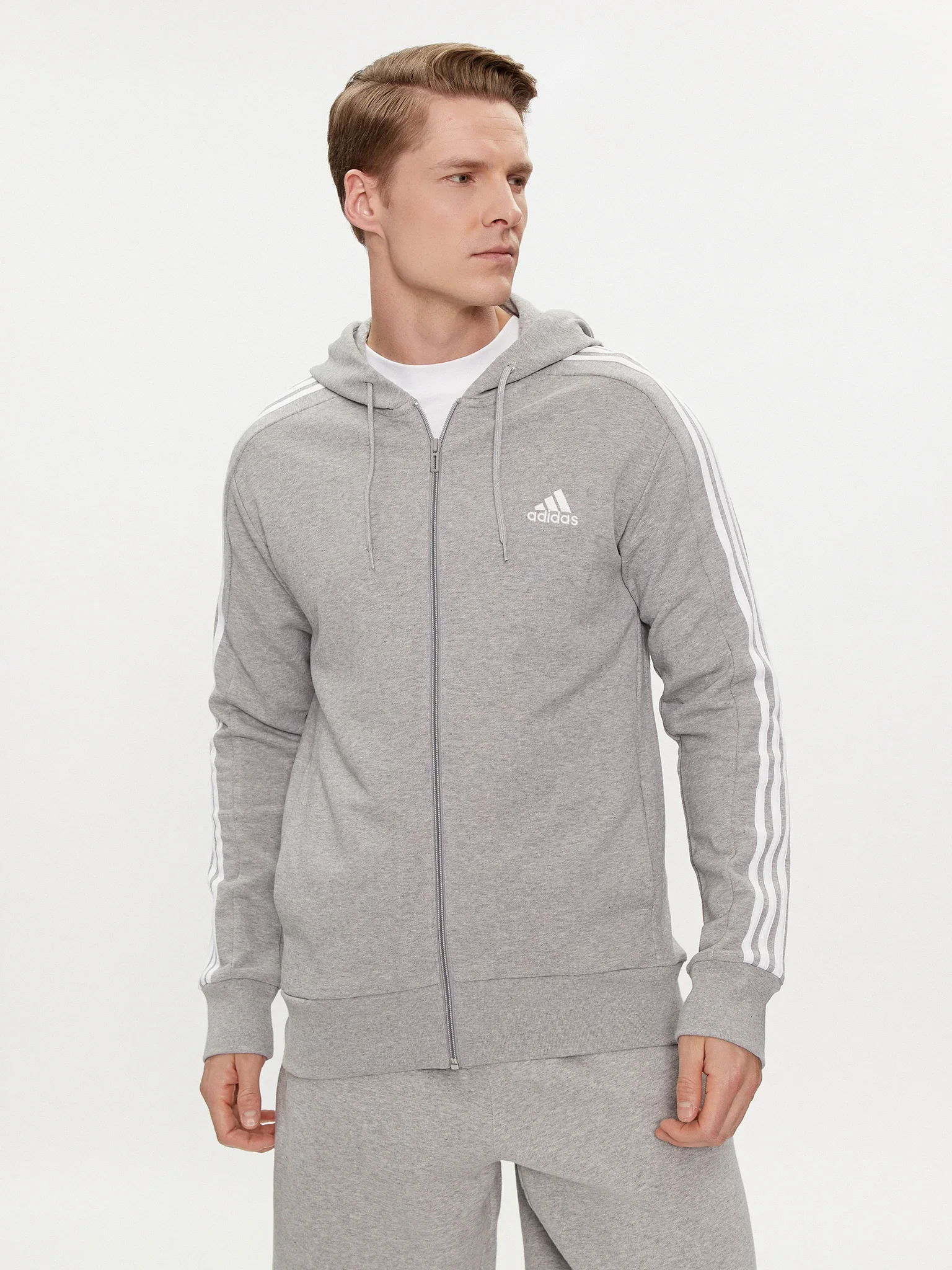 Φωτογραφία προϊόντος: Adidas Essentials 3-Stripes Ανδρική Ζακέτα Fleece με Κουκούλα και Φερμουάρ Γκρι IJ6479 ΓΚΡΙ ADIDAS Σύνθεση: 78% Βαμβάκι, 22%