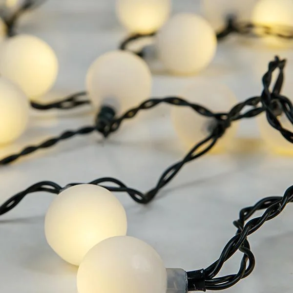 Φωτογραφία προϊόντος: ΣΕΙΡΑ, 80 LED, 31V, ΘΕΡΜΕΣ ΛΕΥΚΕΣ ΜΠΑΛΙΤΣΕΣ Φ2CM, ΜΕ ΜΕΤΑΣΧΗΜΑΤΙΣΤΗ, ΠΡΟΕΚΤΑΣΗ ΠΑΡΟΧΗΣ 300CM, ΠΡΑΣΙΝΟ ΚΑΛΩΔΙΟ, ΑΝΑ 8CM, IP44 (600-11912)