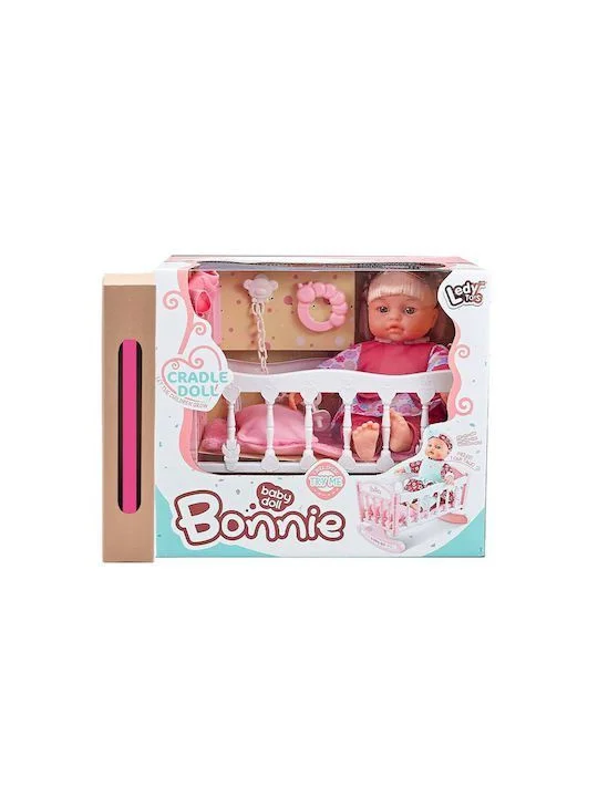Φωτογραφία προϊόντος: Μωρό κούκλα Bonnie cradle doll σε κούνια μιλάει ελληνικά 30cm και δώρο λαμπάδα