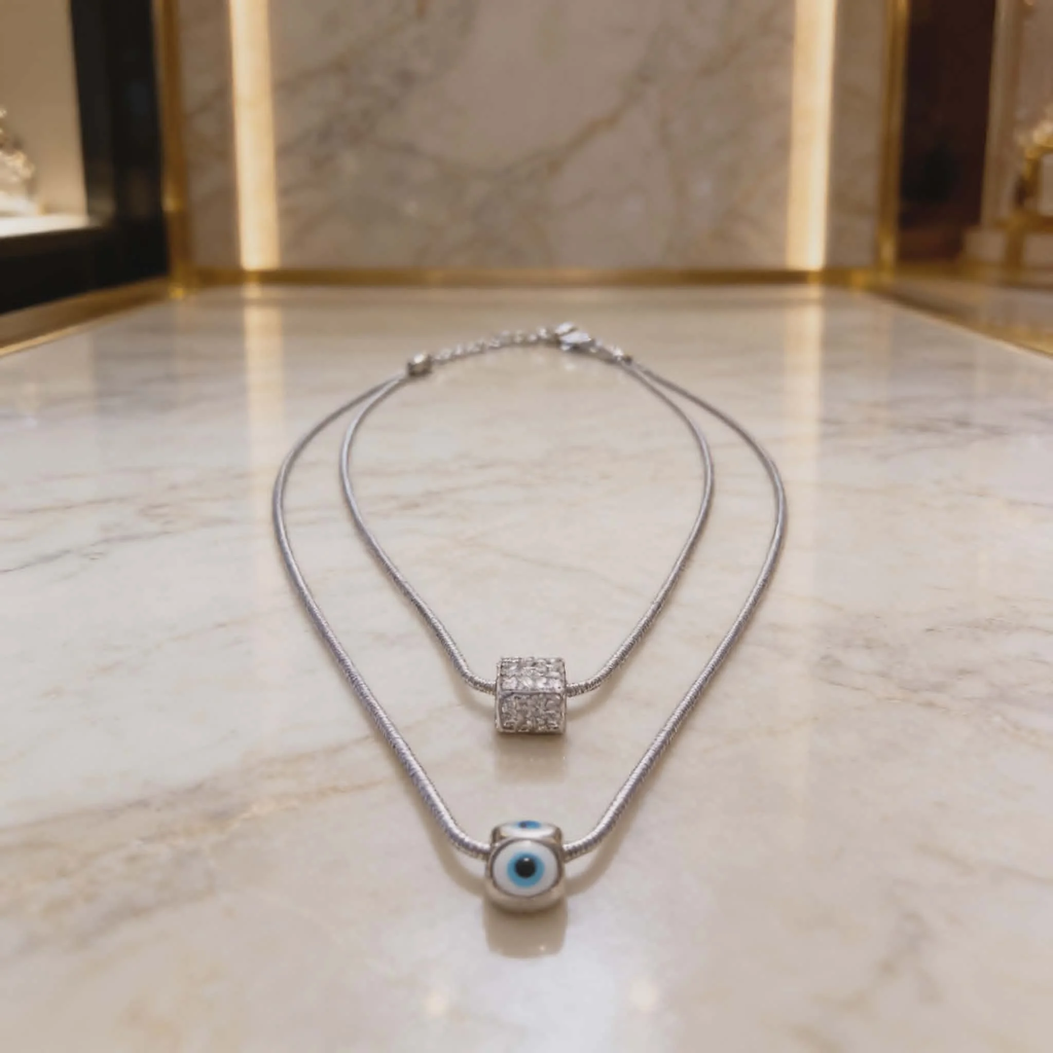 Φωτογραφία προϊόντος: LAVORE Double Layer Necklace with Evil Eye & Crystal Pendant Silver Stainless Steel