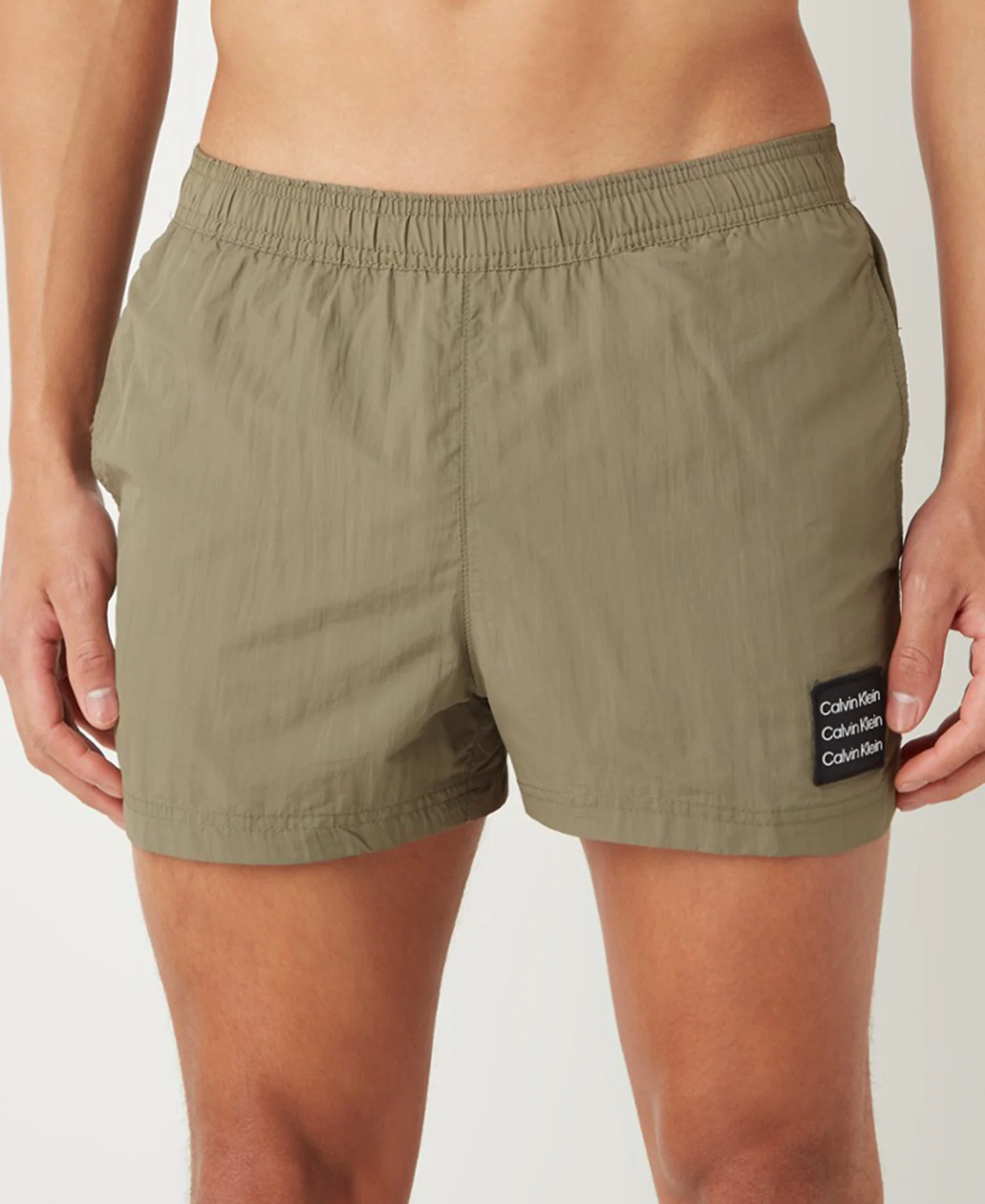 Φωτογραφία προϊόντος: Calvin Klein ανδρικό μαγιό χακί polyester regular fit km0km00712-msp