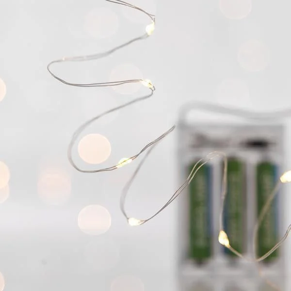 Φωτογραφία προϊόντος: ΣΕΙΡΑ 20 MINI LED, ΜΠΑΤΑΡΙΑΣ, 3xAA, ΠΡΟΕΚΤΑΣΗ ΠΑΡΟΧΗΣ 10cm, ΑΣΗΜΙ ΧΑΛΚΟΣ, ΛΕΥΚΟ LED, ΑΝΑ 10cm, IP20