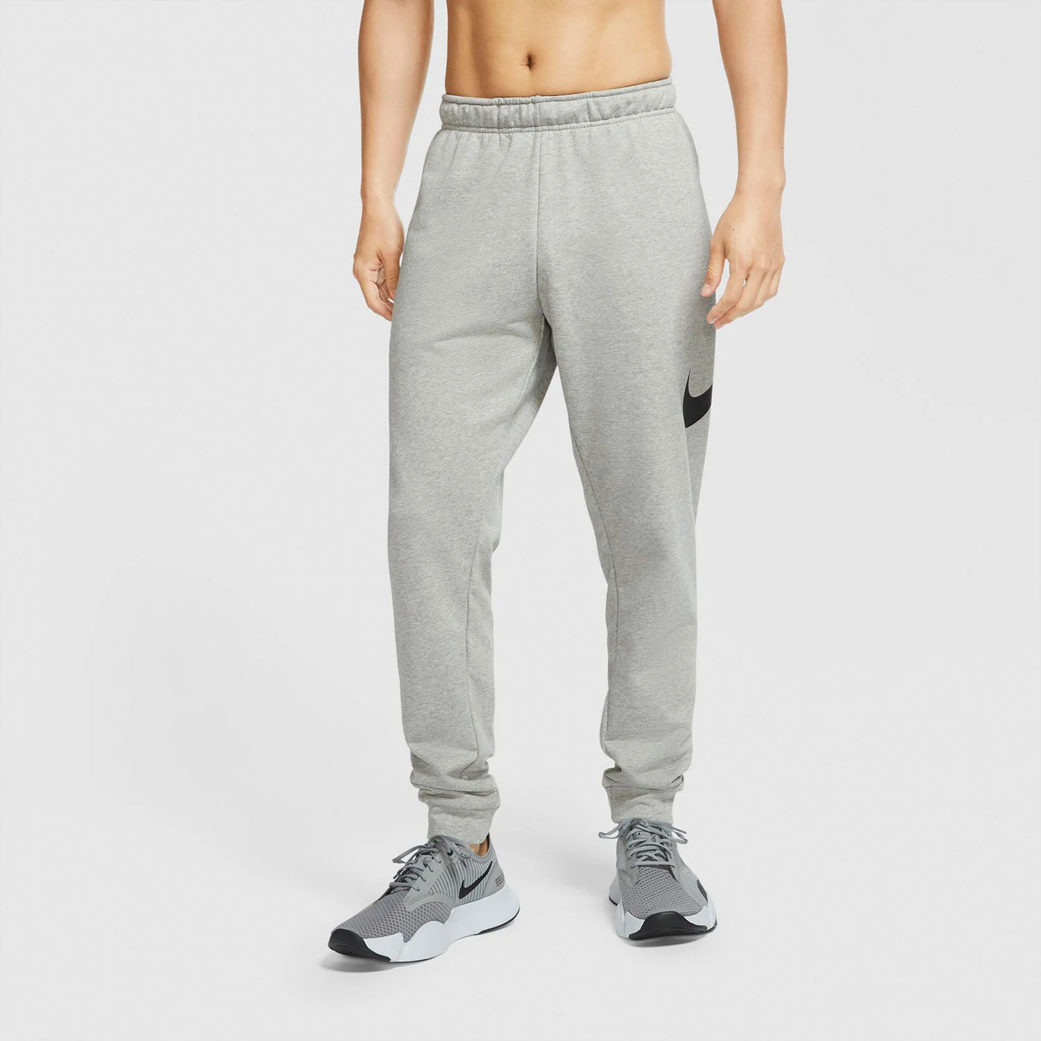 Φωτογραφία προϊόντος: NIKE DRI-FIT TAPERED TRAINING PANTS ΓΚΡΙ