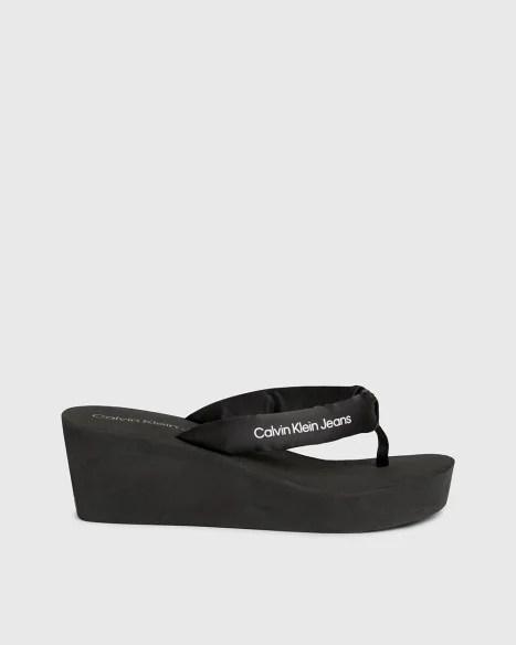Φωτογραφία προϊόντος: CALVIN KLEIN ΓΥΝΑΙΚΕΙΑ ΣΑΓΙΟΝΑΡΑ BEACH WEDGE SANDAL PADDED NY YW0YW01397 SS24, ΜΑΥΡΟ, Γυναίκα