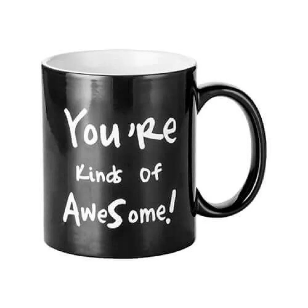 Φωτογραφία προϊόντος: HOPER Κούπα Μαγική (YOU RE KINDS OF AWESOME! ) είναι με συσκευασία δώρου η κούπα ειναι μαύρη και εμφανίζετε το μήνυμα όταν μπει ζεστό ρόφημα