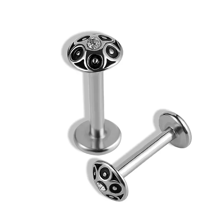 Φωτογραφία προϊόντος: Nire Ατσάλινο Piercing με ζιργκόν και ανάγλυφο σχέδιο – SS169B