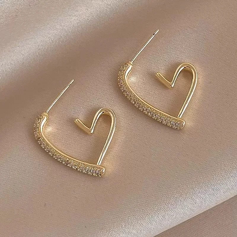 Φωτογραφία προϊόντος: Peach Jewelry Σκουλαρίκια Καρδιά Με Λευκά Ζιρκόν Ασήμι 925 Επιχρυσωμένο Symbol