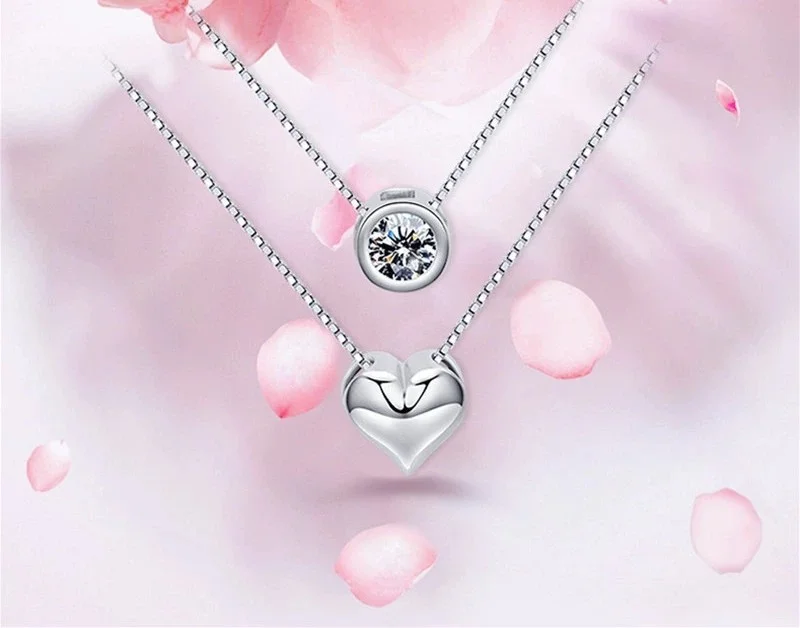 Φωτογραφία προϊόντος: Peach Jewelry Symbol Μενταγιόν 2πλο Καρδιά Ροζέτα Ασημι 925