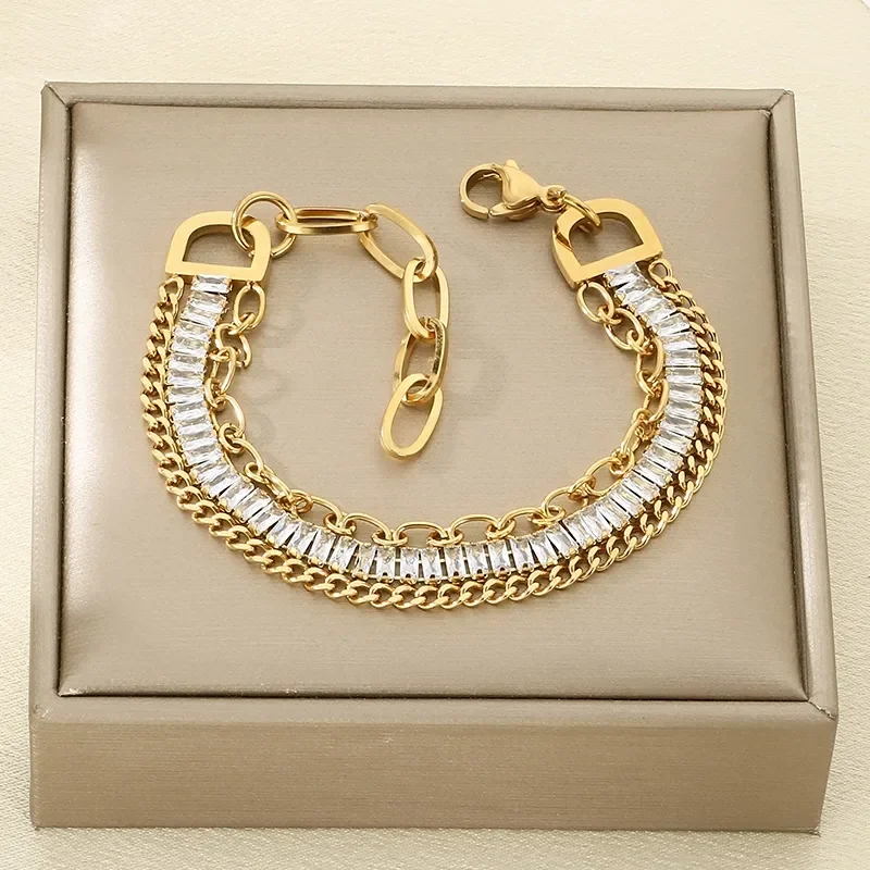 Φωτογραφία προϊόντος: Peach Jewelry Βραχιόλι Τριπλό Αλυσίδα Και Σειρά Με Ορθογώνια Λευκά Ζιρκόν Ανοξείδωτο Ατσάλι 316 Επιχρυσωμένο