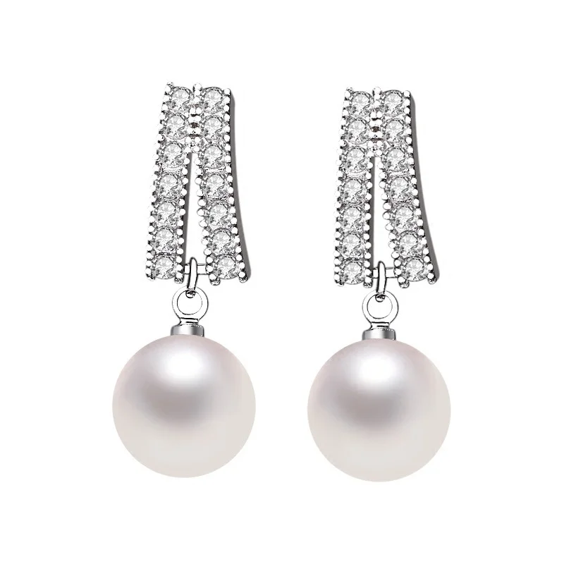 Φωτογραφία προϊόντος: Peach Jewelry Σκουλαρίκια Πέρλα Με Λευκά Ζιρκόν Ασήμι 925 Symbol