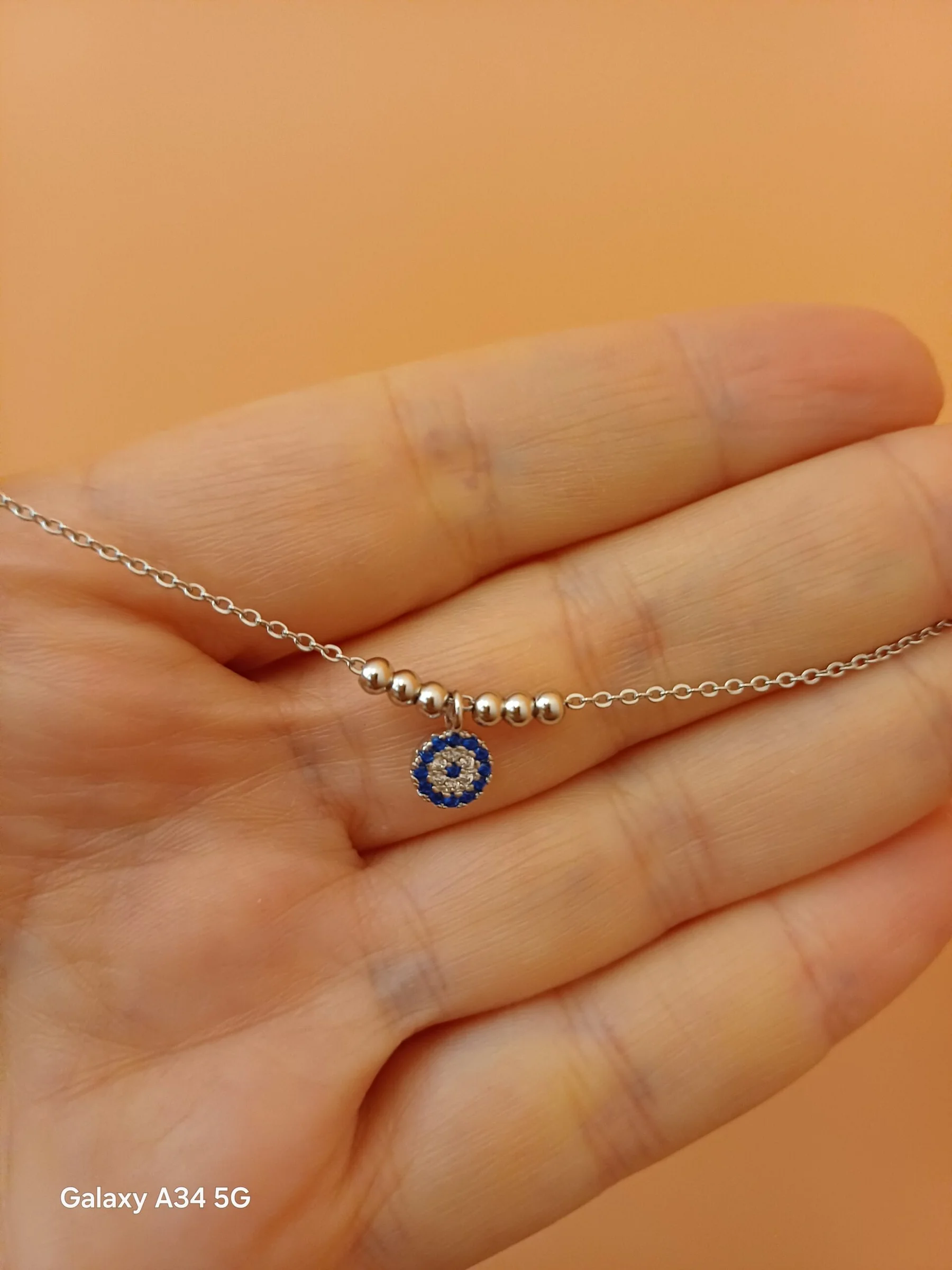 Φωτογραφία προϊόντος: Peach Jewelry Symbol Bραχιολι Ποδιού Ασημι 925 Ποδιού Ματάκι