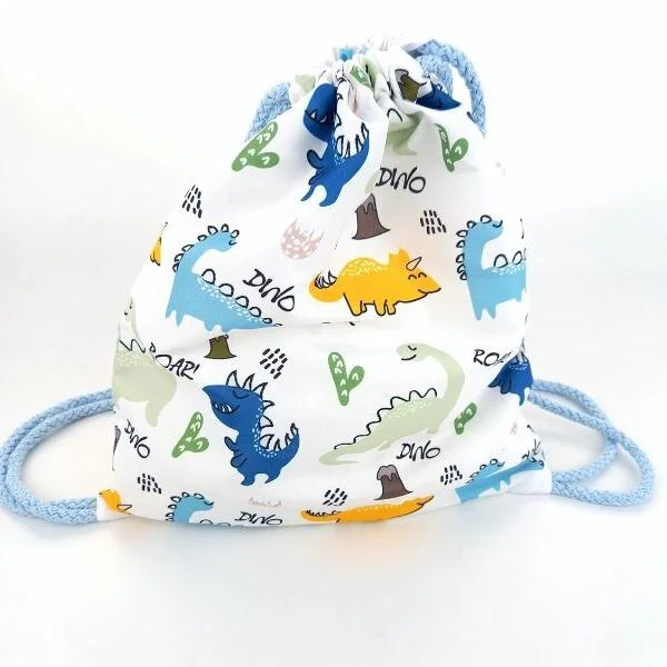 Φωτογραφία προϊόντος: ED Collection ΤΣΑΝΤΑ ΥΦΑΣΜΑΤΙΝΗ BACKPACK DINO 25X30CM ΜΕ ΚΟΡΔΟΝΙ